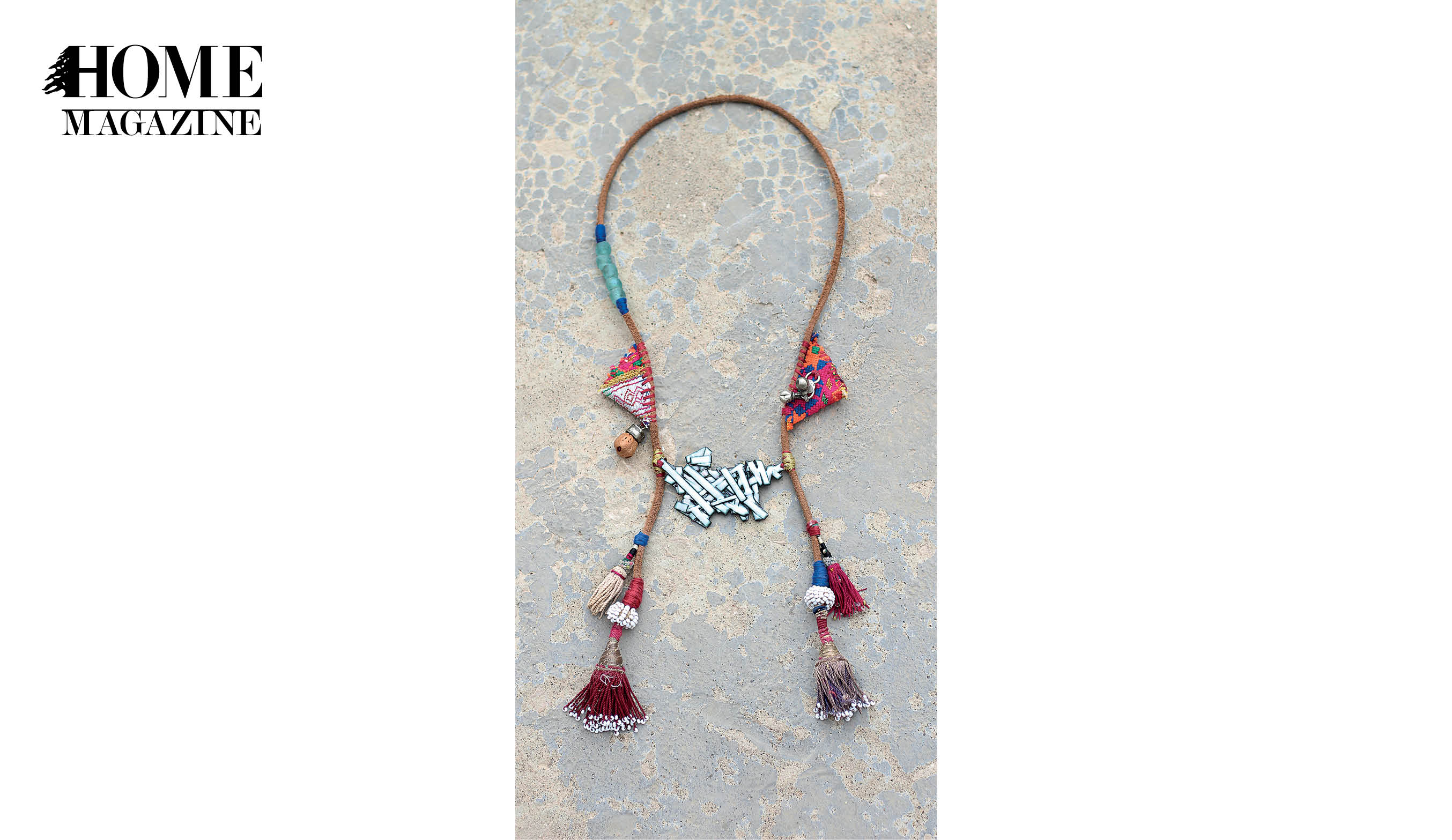 Necklace with middle white shape and multicolored textile