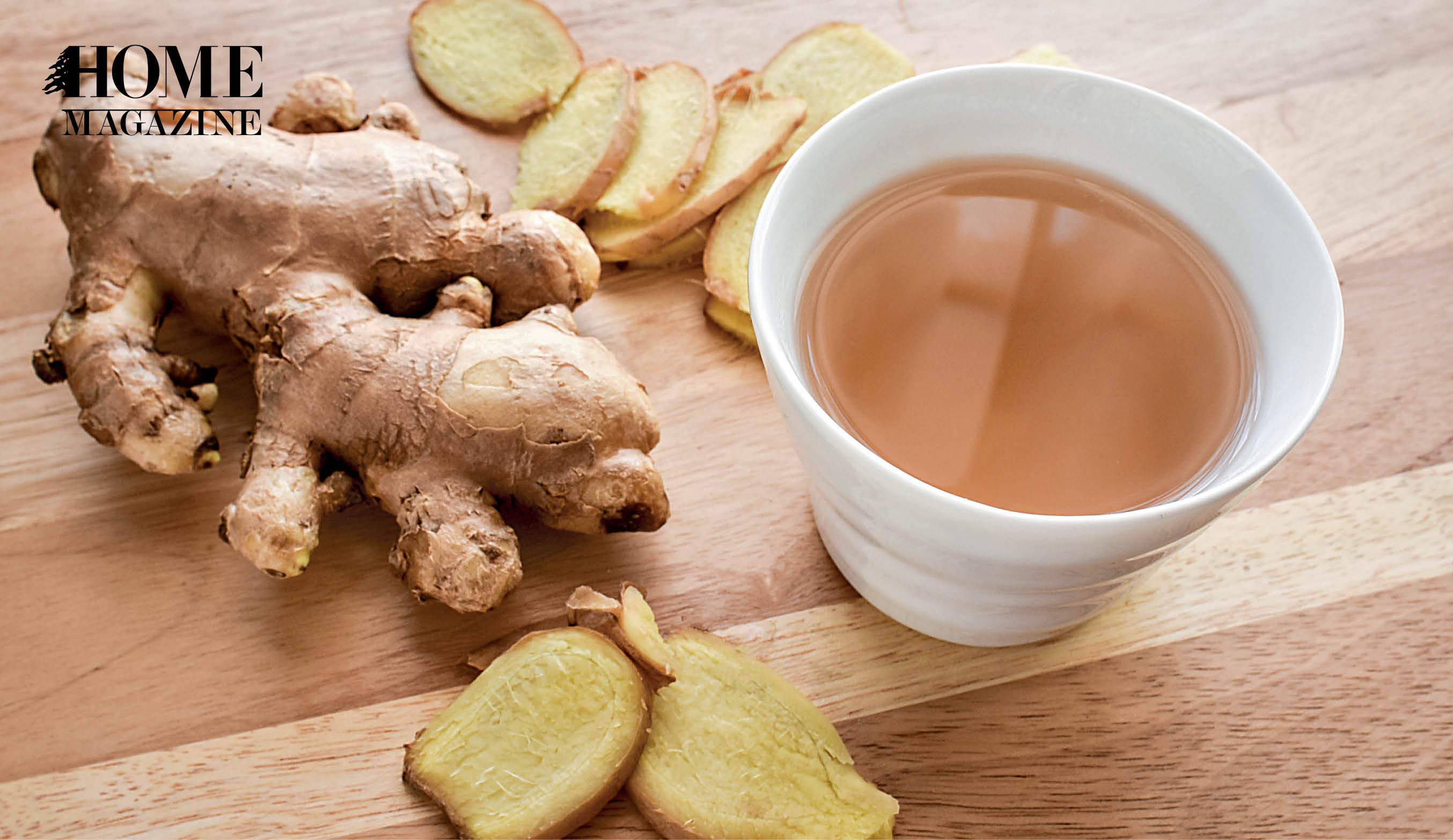 Ginger and ginger tea in white cup