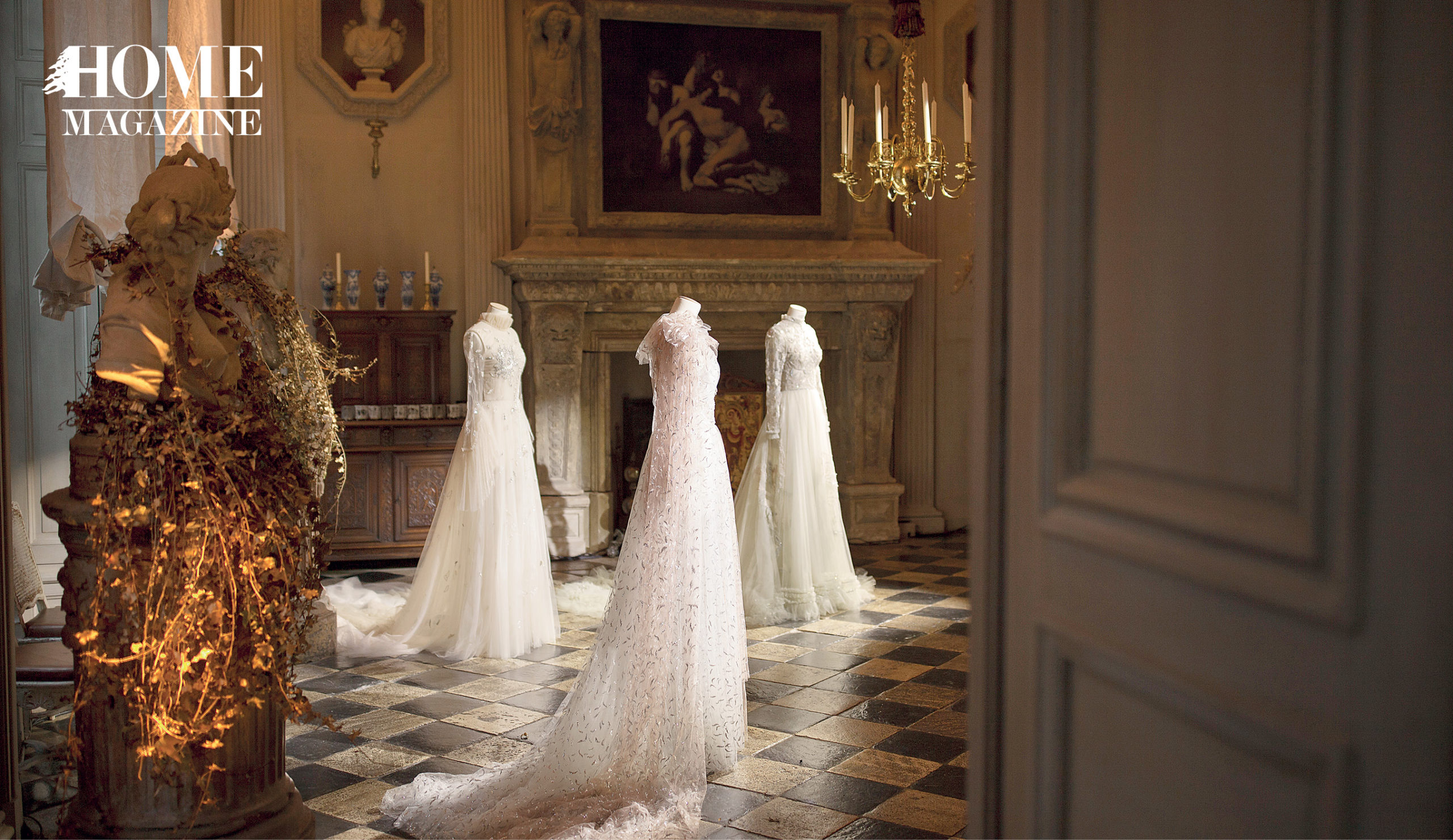 Three bridal dresses on mannequins in salon