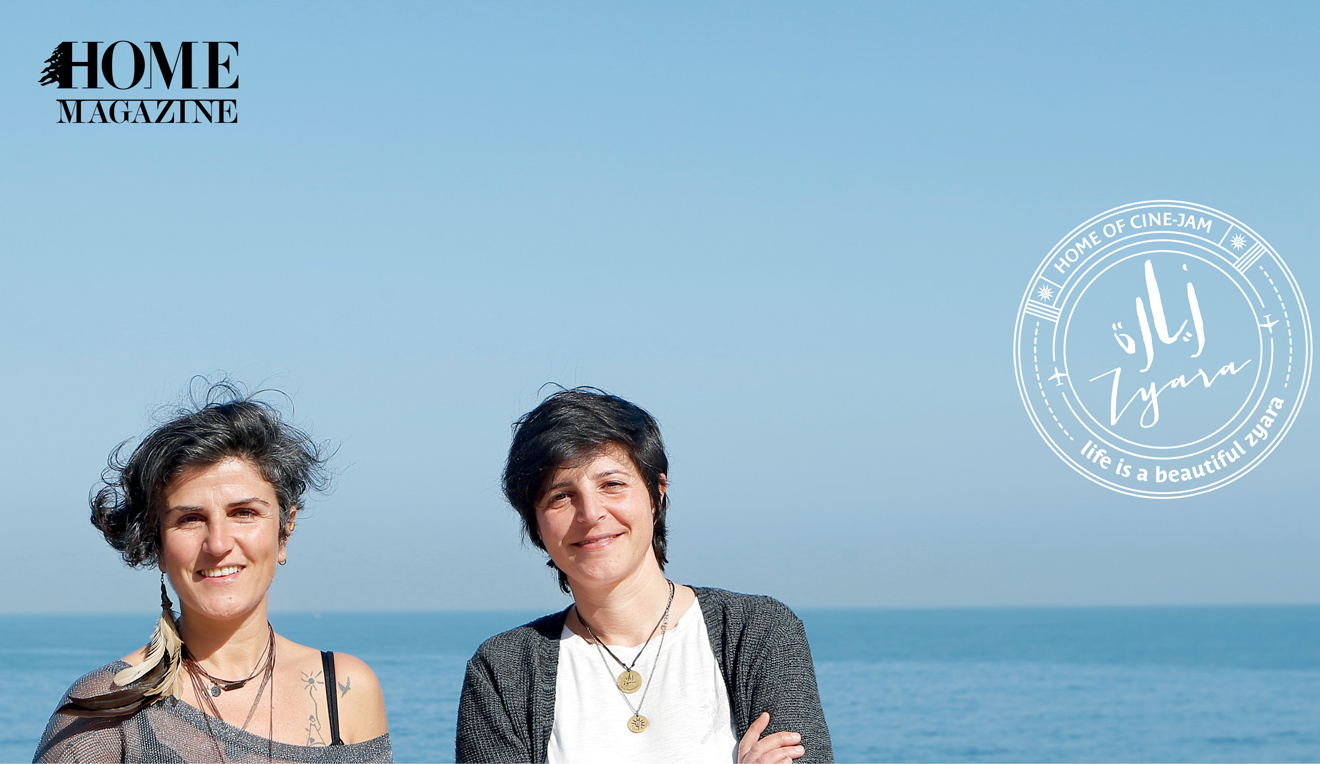 Two women with short hair and sea blue background